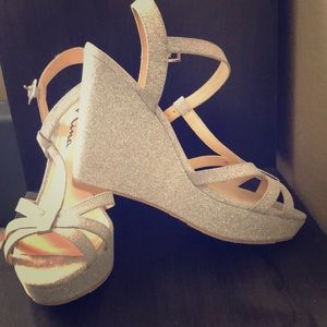 Silver sparkly wedges never worn.